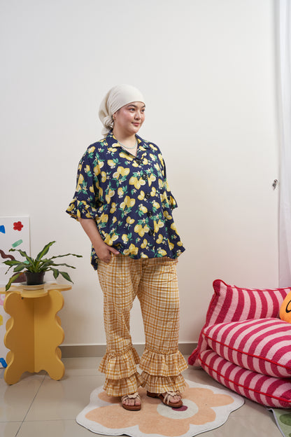 Full-body front-side view of Buttoned Belle Blouse in Lemon Dream, styled with Flutter Flair Pants in Lemonade for a complete coordinated look